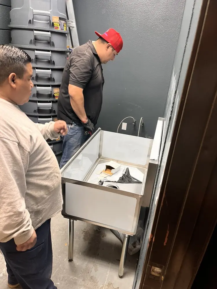 Commercial plumbing and sink installation in Pella